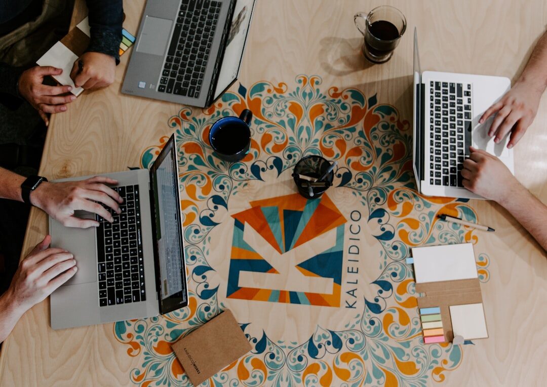 Team of professionals working together at a conference table