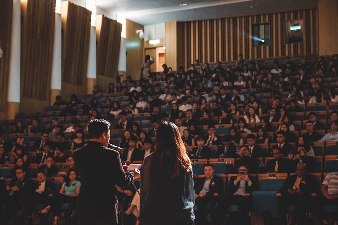 Business forum with speakers and audience