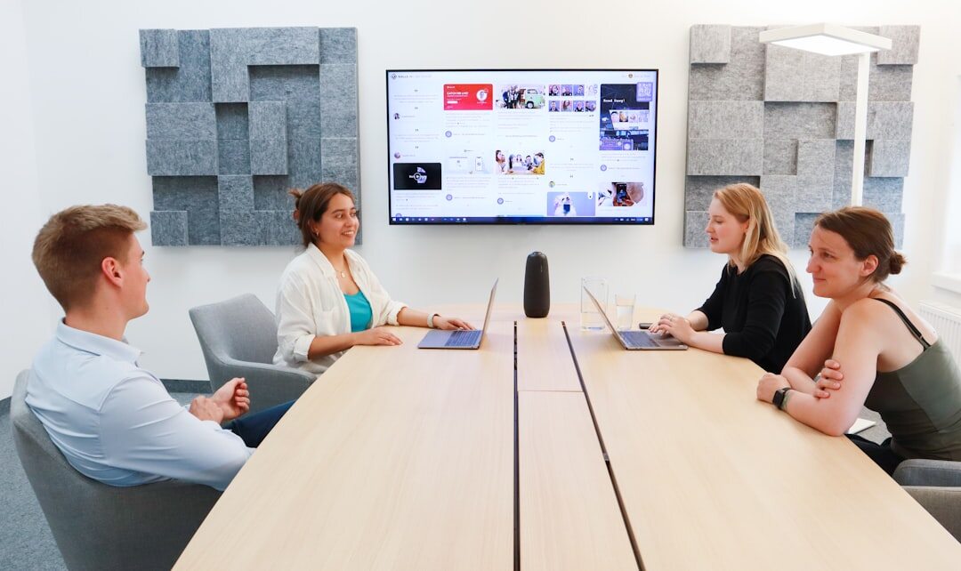 Modern conference room with AV equipment and screens