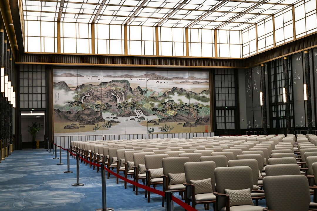 Large conference hall with audience and stage